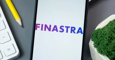 Finastra Logo on Phone Screen, Company Icon on Display.