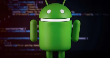 A green Google Android figure on digital blur background.