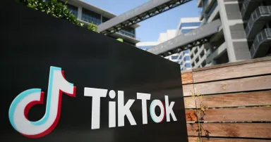 <p>The TikTok logo is displayed outside a TikTok office on August 27, 2020 in Culver City, California. The Chinese-owned company is reportedly set to announce the sale of U.S. operations of its popular social media app in the coming weeks following threats of a shutdown by the Trump administration. (Photo by Mario Tama/Getty Images)</p>
