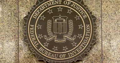 The FBI seal is seen on its headquarters at the J. Edgar Hoover FBI building in Washington.