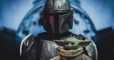 scene from Disney Plus Star Wars The Mandalorian with Din Djarin and Grogu in the cockpit of a Naboo N1 starfighter - Hasbro action figure