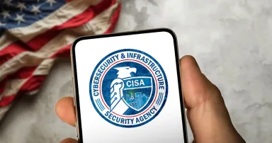 Cybersecurity and Infrastructure Security Agency CISA logotype displayed on smartphone