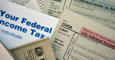 <p>Federal tax forms are distributed at the offices of the Internal Revenue Service on Nov. 1, 2005, in Chicago. (Photo Scott Olson/Getty Images)</p>