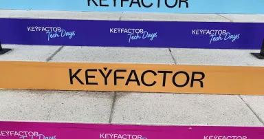 Steps in different colors reading KEYFACTOR Tech Days.