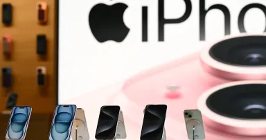 Apple iPhone 15s are displayed for sale