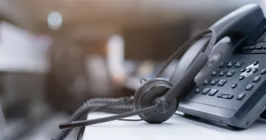 A headset with a telephone