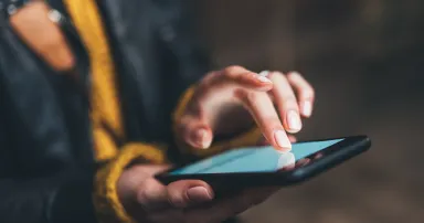 Bloggers touch screen smartphone light night city, girls using in hands mobile phone closeup, online wi-fi internet, woman texting text message