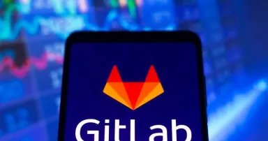 In this photo illustration, the GitLab logo seen displayed on a smartphone screen.