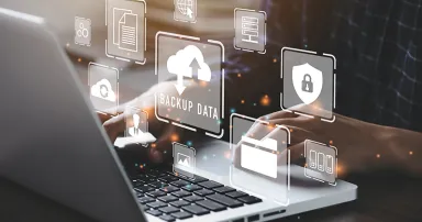 Businessman using a computer to backup storage data Internet technology concept for backup online documentation database and digital file storage system or software,file access, doc sharing.