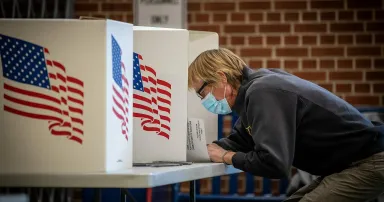 <p>Voters in Des Moines cast their ballots at Roosevelt High School. (Phil Roeder/CC BY 2.0)</p>
