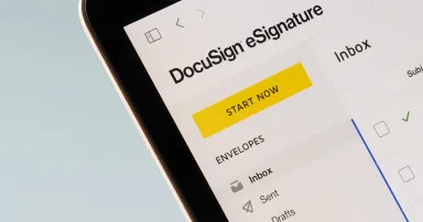 Closeup of the DocuSign inbox page seen on a MacBook computer.