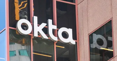 An Okta sign is seen on its headquarters in San Francisco.