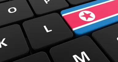 Computer keyboard, close-up button of the flag of North Korea.