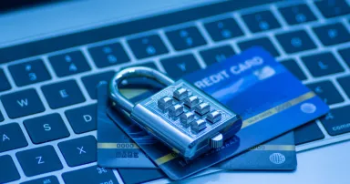 <p>Credit cards and lock on keyboard.</p>
