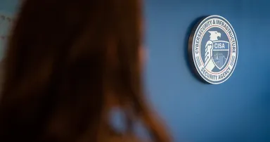 The Cybersecurity and Infrastructure Security Agency (CISA) emblem is seen at its headquarters in Arlington, Va.