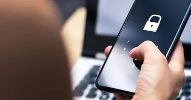 Phishing, mobile phone hacker or cyber scam concept. Password and login pass code in smartphone. Online security threat and fraud. Female scammer with cellphone and laptop. Bank account security.
