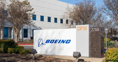 A sign with the Boeing logo is seen outside a company facility