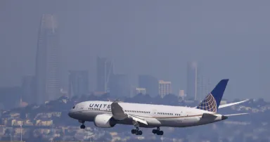 <p>A United Airlines 787 Dreamliner lands at San Francisco International Airport on October 19, 2021 in San Francisco, California. Five Republican Senators are asking the Biden administration to hold off on an emergency cybersecurity directive for rail and aviation companies and engage more with industry to avoid &#8220;unintended consequences.&#8221; (Photo by Justin Sullivan/Getty Images)</p>
