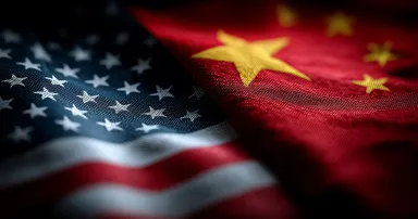 American and Chinese flags side by side representing trade war, tariffs, and geopolitical issues - AI generated
