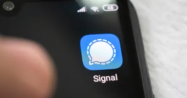 The Signal app icon on a smartphone.