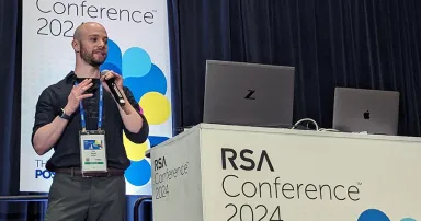 <p>Dor Segal, a senior security researcher at Silverfort, speaks at a Monday session at the RSA Conference in San Francisco. (Tom Spring / SC Media)</p>
