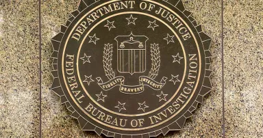 The FBI seal is seen on its headquarters at the J. Edgar Hoover FBI building in Washington.