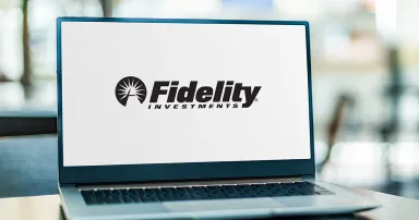 Laptop computer displaying logo of Fidelity, an American multinational financial services corporation based in Boston, Massachusetts