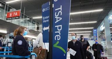 <p>Today’s columnist, Ryan Davis of NS1, says the TSA’s slogan of “see something, say something,” should become a mantra for all security organizations in today’s heightened threat environment. (Photo by Scott Olson/Getty Images)</p>
