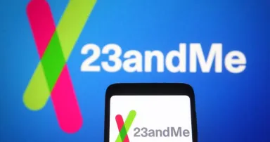 <p> In this photo illustration, 23andMe logo of a biotechnology company is seen on a smartphone and a pc screen in the background. (Photo Illustration by Pavlo Gonchar/SOPA Images/LightRocket via Getty Images)</p>
