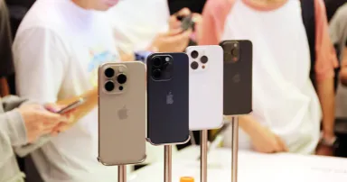 Customers check out the newly launched iPhone 15 at Apple's flagship store in Shanghai, China, on September 24, 2023. (Photo by Costfoto/NurPhoto via Getty Images)