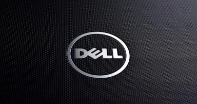 Dell logo on textured black laptop, close up